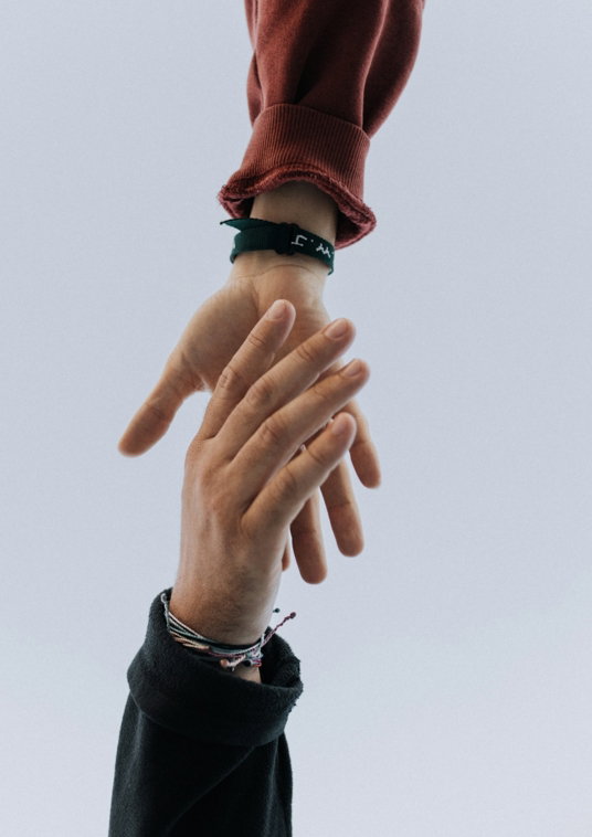 view-of-two-persons-hands.jpg view of two persons hands